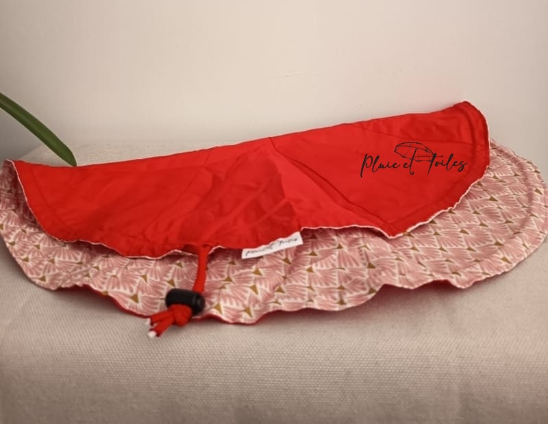 protection selle de vélo rouge et rose ouverte Pluie et Toiles Saint Brieuc